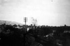 Bombs on the Railway Folkestone smoke to right of telegraph pole.