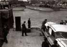 &quot;Bertie&quot; Smail in charge,  Lt Smail RNVR escorting the Admiral. The boat that the German Admiral Breuning is boarding is &quot;manned&quot; by WRENS.